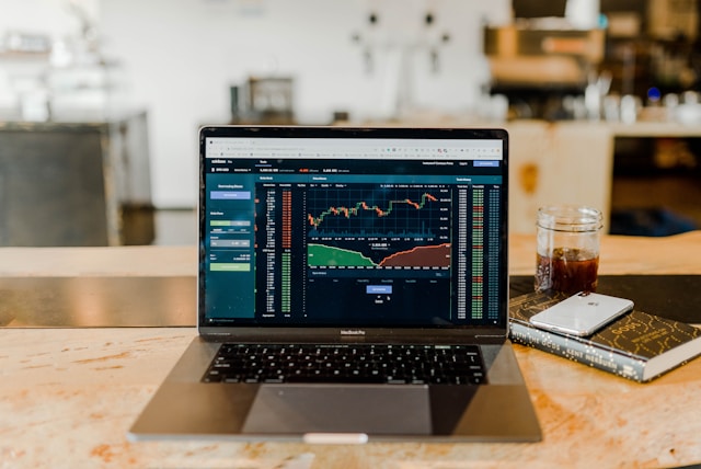 A simple graphic showing three different paths up a mountain, labeled "Mutual Fund," "Index Fund," and "ETF," with the Index Fund and ETF paths being straighter and smoother.