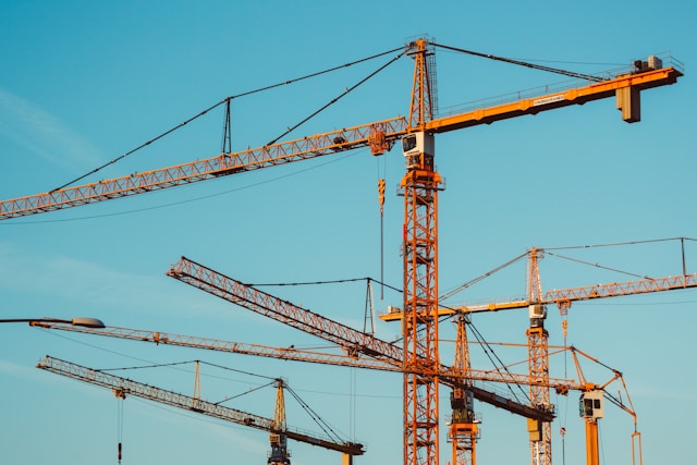 (Image of a compass next of a real estate contract): Representing the need for strategic direction and navigation through different market conditions.